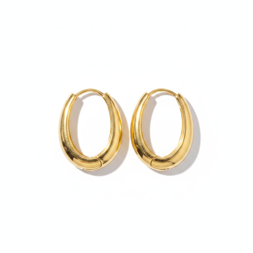 Chunky Gold Oval Hoop Earrings Horizontal Flat Lay