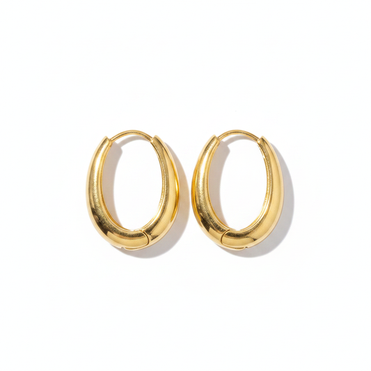 Chunky Gold Oval Hoop Earrings Horizontal Flat Lay