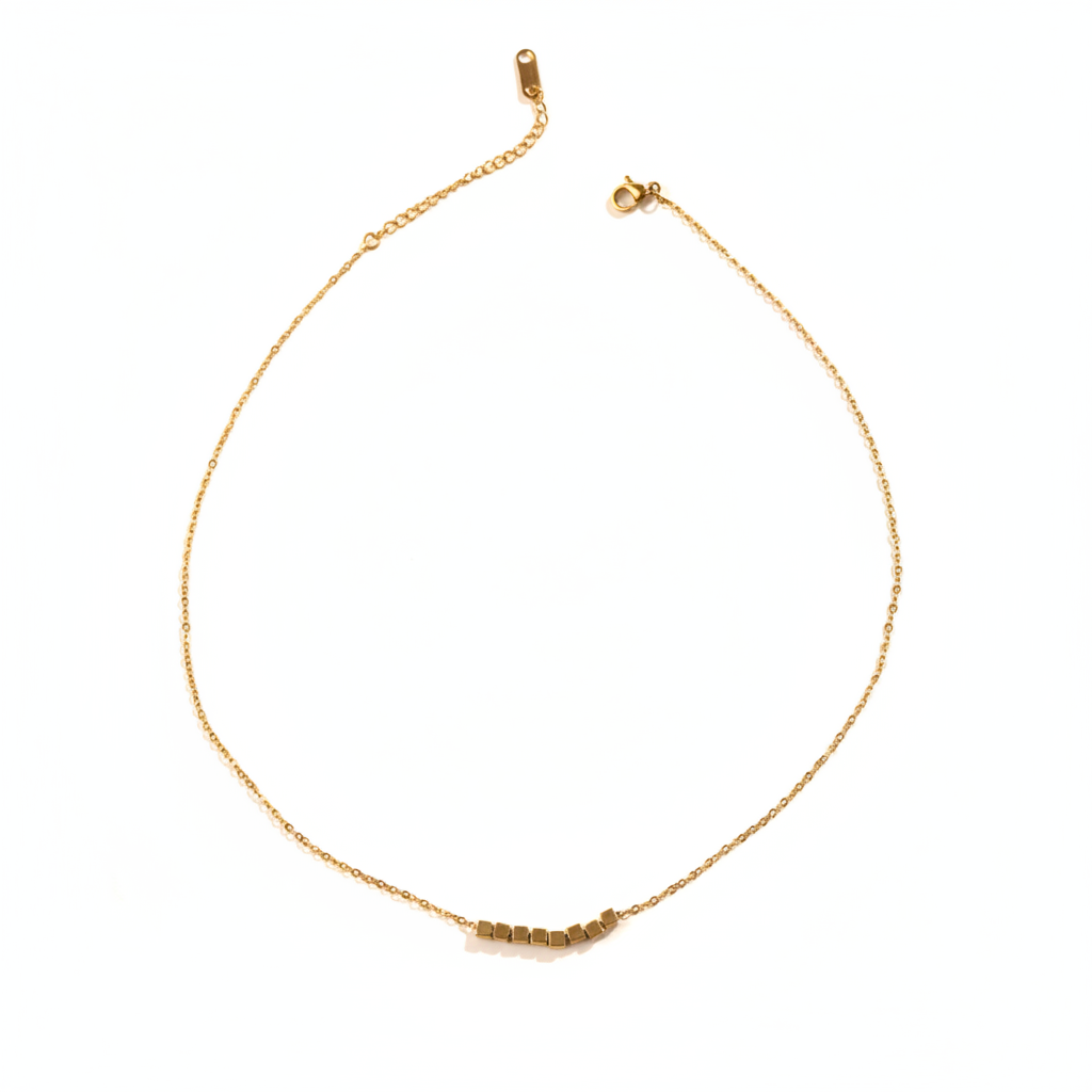 Gold Cube Bead Bar Necklace White Background
