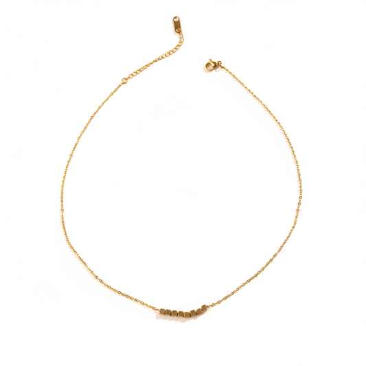 Gold Cube Bead Bar Necklace White Background