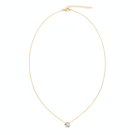 Gold Solitaire Necklace Laid Flat - White Background